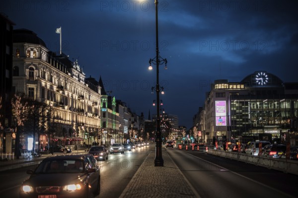 A vibrant city street in the evening with glowing lights and historic buildings in Helsingborg, Sweden, Scandinavia, Northern Europe