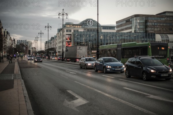 Busy evening traffic on a city road, surrounded by modern buildings in Helsingborg, Sweden, Scandinavia, Northern Europe