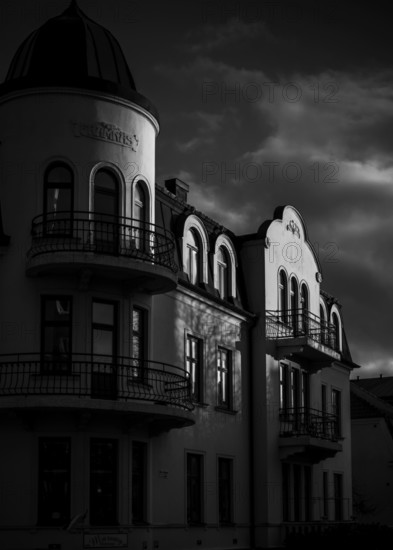 Historic European building in black and white with dramatic shadows and cloudy sky in Helsingborg, Sweden, Scandinavia, Northern Europe