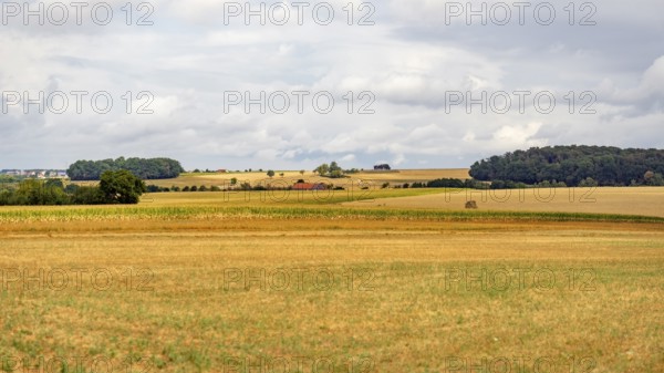 Stormy farmland scenery in Hohenlohe, an area in Southern Germany at late summer time
