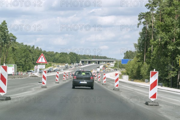 Scenery on a german motorway with road construction zone in sunny summer ambiance