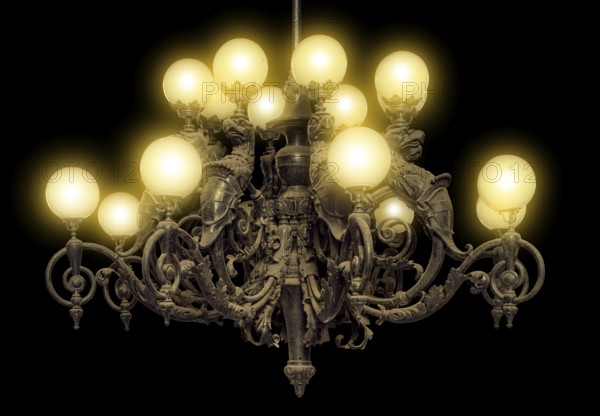 Illuminated historic dusty chandelier in black back