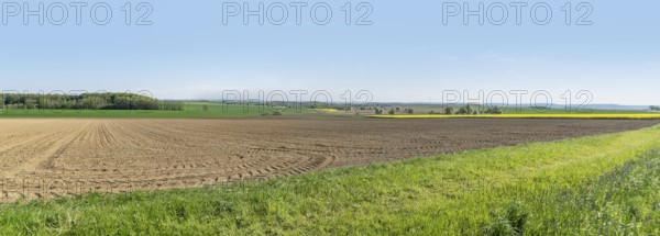 Sunny illuminated idyllic rural springtime scenery in Hohenlohe, a district in Southern Germany