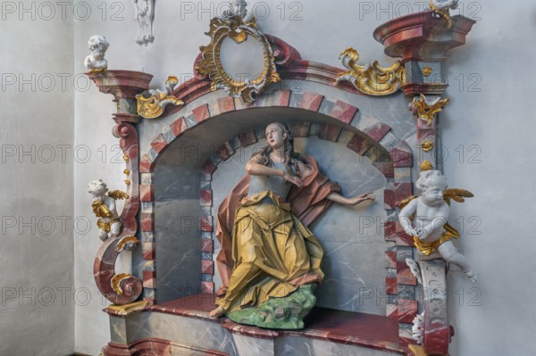 Church of St Gallus and Ulrich, niche with female figure of a saint and putti, Kisslegg, Allgäu, Baden-Württemberg, Germany