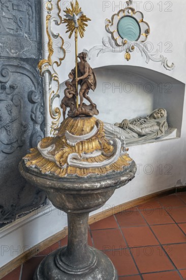 Church of St Gallus and Ulrich, baptismal font and niche with female figure, Kisslegg, Allgäu, Baden-Württemberg, Germany