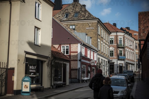 Charming street with colorful buildings and a hotel under a blue sky in Helsingborg, Sweden, Scandinavia