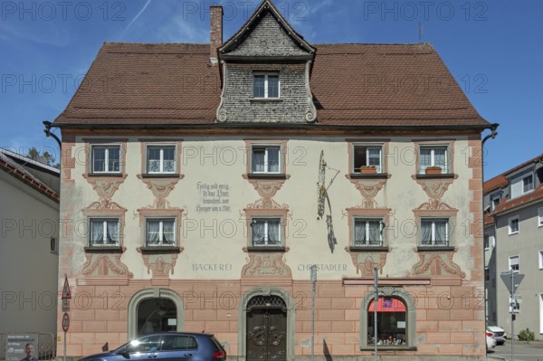 Facade with painting and nose sign, house of a bakery in Kisslegg, Allgäu, Baden-Württemberg, Germany