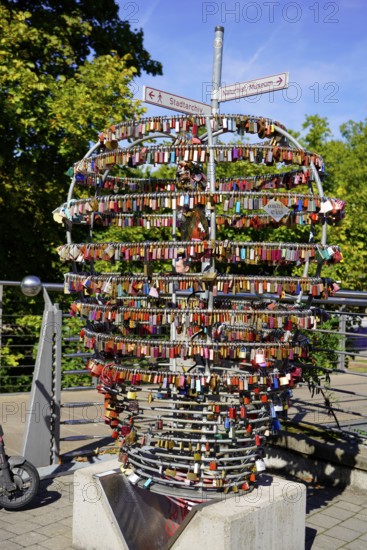 Large arrangement of colourful heart-shaped padlocks on a railing, Nuremberg, Middle Franconia, Franconia, Bavaria, Germany