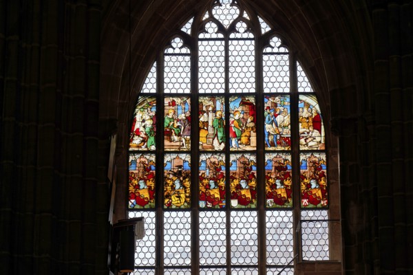 Large stained glass window depicting religious scenes in a Gothic church, Church of St. Lawrence, Nuremberg, Middle Franconia, Franconia, Bavaria, Germany