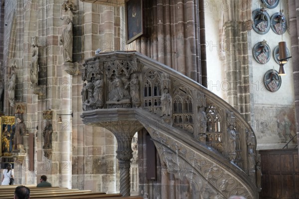 Detail of an ornately carved pulpit in an old church with depictions and figures, Church of St Lawrence, Nuremberg, Middle Franconia, Franconia, Bavaria, Germany
