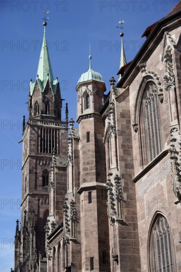 Gothic cathedral with high towers and decorated façade under a clear sky, Church of St Lawrence, Nuremberg, Middle Franconia, Franconia, Bavaria, Germany