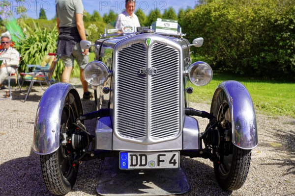 DKW, year of construction 1937, Oldtimer Classic, Gala International Concours d'Elegance Schwetzingen 2025, Germany, Europe, Metallic shiny historic car from the front at an exhibition