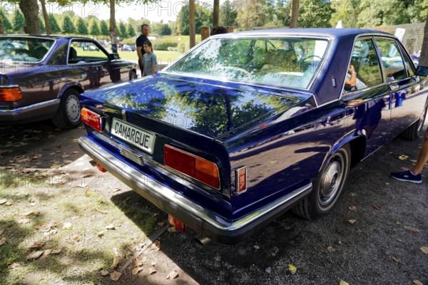 Oldtimer Classic, Gala International Concours d'Elegance Schwetzingen 2025, Germany, Europe, Blue classic car in the park in sunny weather