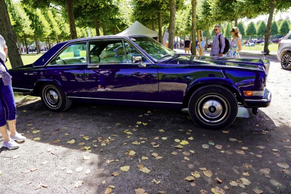Oldtimer Classic, Gala International Concours d'Elegance Schwetzingen 2025, Germany, Europe, side view of a dark blue Rolls-Royce Camargue in a park-like setting