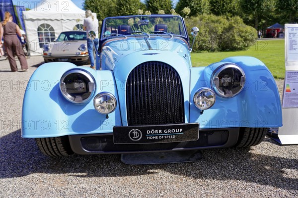 Morgan Plus Four MY 25, Oldtimer Classic, Gala International Concours d'Elegance Schwetzingen 2025, Germany, Europe, Blue Morgan Cabriolet in classic design with open seats on an exhibition site