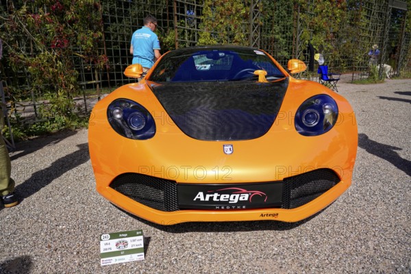 Artega, year of construction 2011, Oldtimer Classic, Gala International Concours d'Elegance Schwetzingen 2025, Germany, Europe, frontal view of an orange Artega sports car with shiny optics at a car show