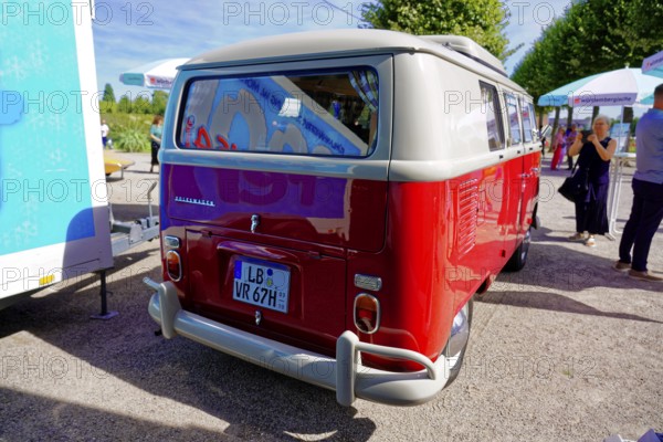 Oldtimer Classic, Gala International Concours d'Elegance Schwetzingen 2025, Germany, Europe, Rear view of a VW Bulli classic car in red and white at an exhibition