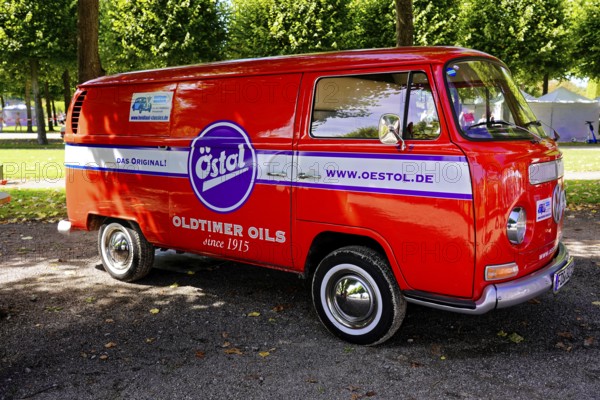 Oldtimer Classic, Gala International Concours d'Elegance Schwetzingen 2025, Germany, Europe, Red vintage van with Oestol lettering in a sunny park