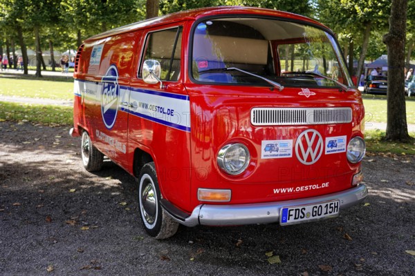 Oldtimer Classic, Gala International Concours d'Elegance Schwetzingen 2025, Germany, Europe, side view of a red VW bus in the park
