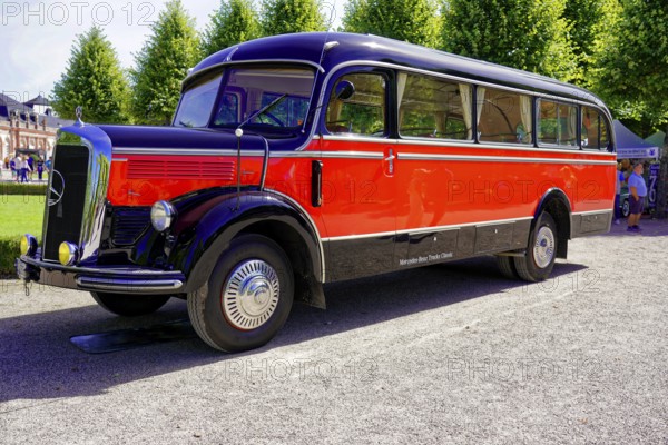 MERCEDES-BENZ 3500, built in 1950, red and black vintage bus in clear skies and sunshine, Oldtimer Classic, Gala International Concours d'Elegance Schwetzingen 2025, Germany