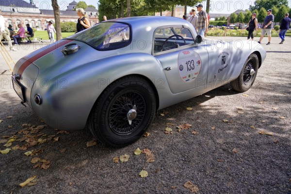 Masarati, Oldtimer Classic, Gala International Concours d'Elegance Schwetzingen 2025, Germany, Europe, side view of a classic silver vintage car with red stripe