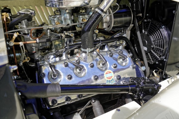 Oldtimer Classic, Gala International Concours d'Elegance Schwetzingen 2025, Germany, Europe, A gleaming engine block in the engine compartment of a classic car with mechanical details
