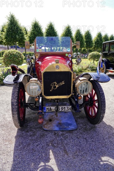 Oldtimer Classic, Gala International Concours d'Elegance Schwetzingen 2025, Germany, Europe, Red Benz vintage car with historic details shows classic elegance on a gravel road