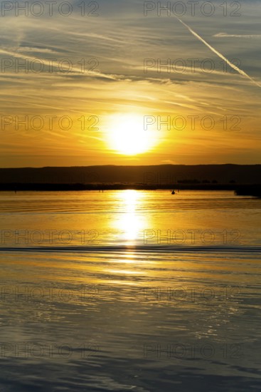 Lake Neusiedl, Burgenland, Austria, Europe, Sunset paints the sky in vivid colours while the water rests still, Sailing boats on Lake Neusiedl