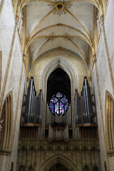 The interior of the largest Protestant church in Germany. It has the world's highest church tower, Ulm Minster, Germany, Europe, Sublime interior of a cathedral with a large organ and remarkable stained glass window, Ulm