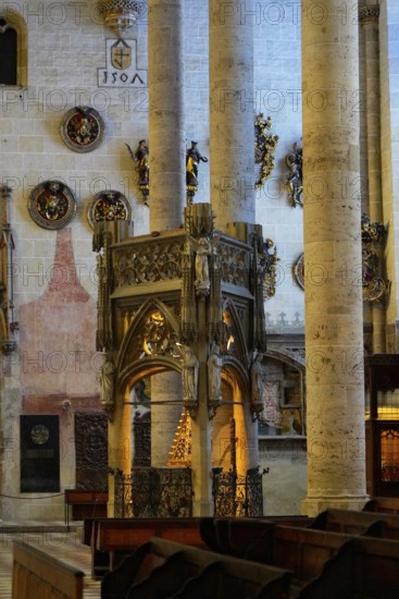 The interior of the largest Protestant church in Germany. It has the world's highest church tower, Ulm Minster, Germany, Europe, Magnificently decorated pulpit with artistic details in a church, Ulm