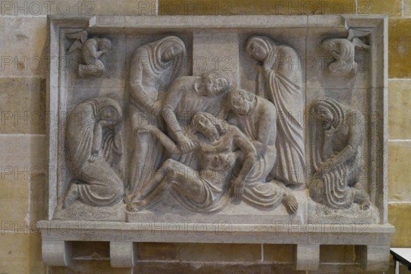 The interior of the largest Protestant church in Germany. It has the world's highest church tower, Ulm Minster, Germany, Europe, Stone relief shows mourning figures in an artistic style, Ulm