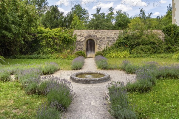 Idyllic park at the Schoental Abbey located in Hohenlohe, a area in Southern Germany at summer time