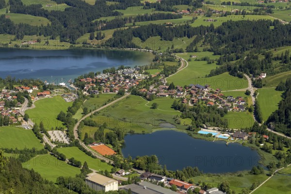 Idyllic aerial view seen from the Immenstaedter Horn around Immenstadt at the Allgaeu region in Swabia, Germany