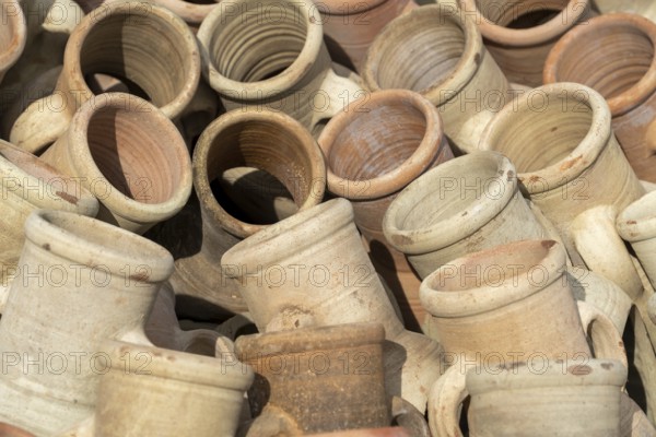 Full frame shot showing lots of sunny illuminated amphoras