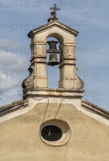 Historic bell seen in Beaumes-de-Venise, a commune in the Vaucluse department in the Provence region in southeastern France