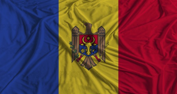 Moldovan flag with fabric texture background. National flag of Moldova