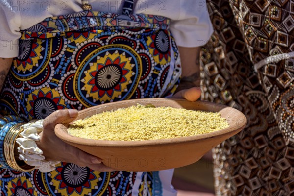 Food on a clay plate to be offered to Exu, an entity of the Afro-Brazilian religions Umbanda and Candomble