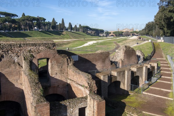 View over ruins of grandstands around curve of Roman Circus Maximus from antiquity, Rome, Lazio, Italy