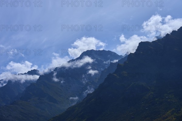 Landscape with dramatic mountain range under blue sky, Drift Bay, Lake Wakatipu, Queenstown-Lakes District, Otago, South Island, New Zealand
