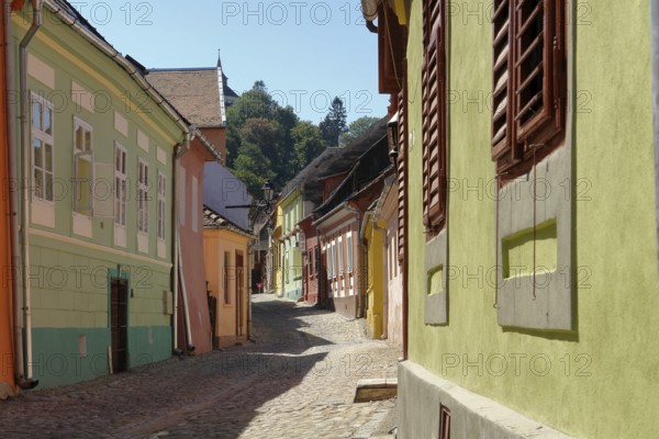 Street scenery in Sighisoara, a city in Transylvania located in Romania