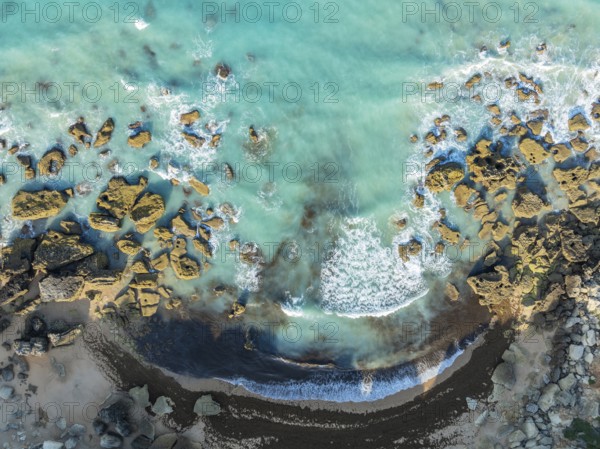 The Roche coves at he Mediterranean Sea. Aerial view. Drone shot. Cádiz province, Andalusia, Spain