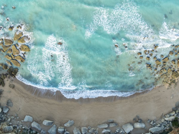 The Roche coves at he Mediterranean Sea. Aerial view. Drone shot. Cádiz province, Andalusia, Spain