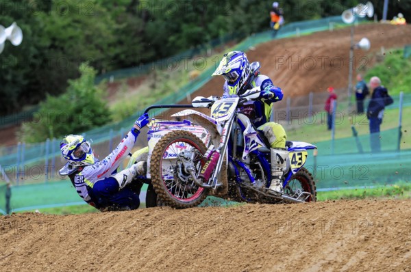 Motocross, Rudersberg, Baden-Württemberg, Germany, Europe, Two riders on a motorbike cross a hill at speed, Rudersberg motocross
