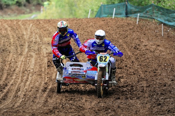 Motocross, Rudersberg, Baden-Württemberg, Germany, Europe, Two riders in a sidecar motocross race on a muddy track, Rudersberg motocross