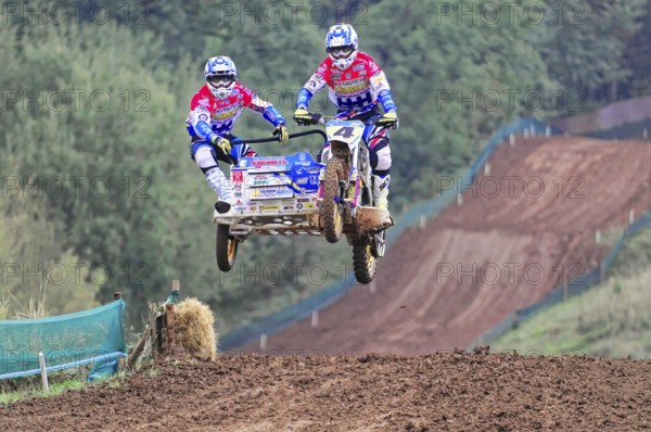 Motocross, Rudersberg, Baden-Württemberg, Germany, Europe, Motocross team with sidecar jumps over a hill on a race track, Rudersberg motocross