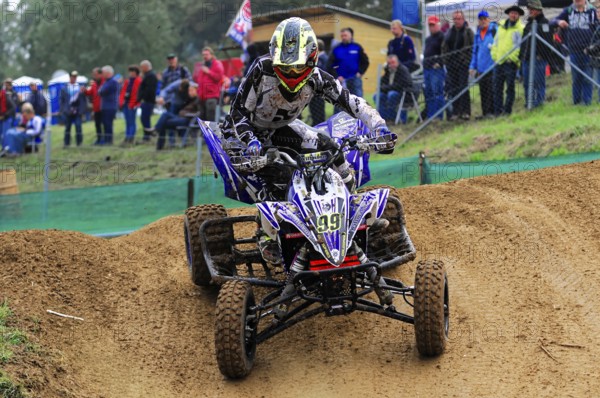 Motocross, Rudersberg, Baden-Württemberg, Germany, Europe, Quad bikers at full speed on a sandy race track with spectators in the background, Rudersberg Motocross