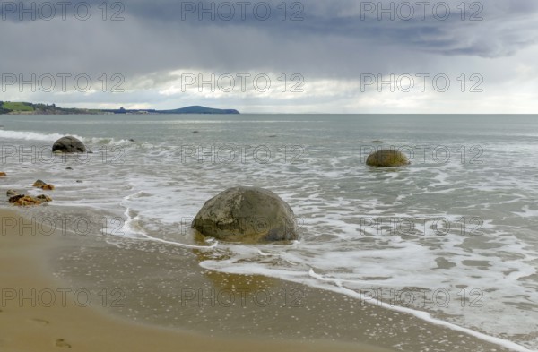 The Moeraki Boulders at Koekohe Beach in New Zealand