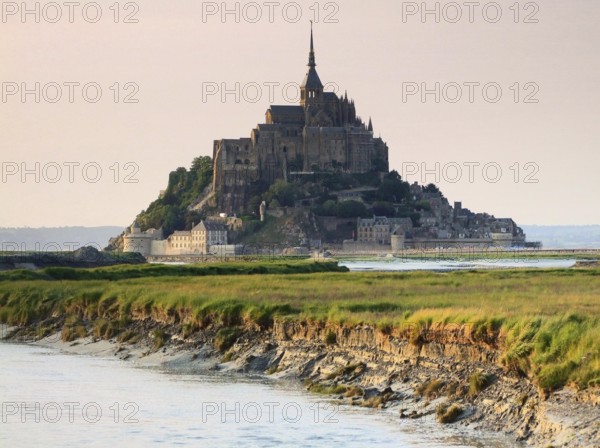 The Mont Saint Michel Abbey in Lower Normandy France at evening time