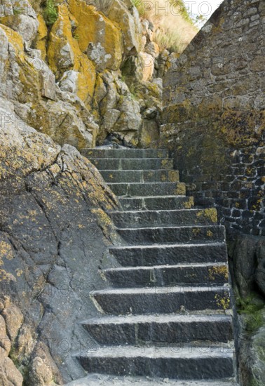 Stairs around the Mont Saint Michel Abbey in Lower Normandy France at evening time