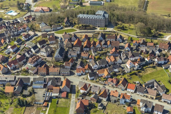 Aerial view, Rhoden in Diemelsee in Hesse, historic town centre with Rhoden Castle, transitional building from a castle complex to a castle, Rhoden Protestant Church. Diemelsee, district Waldeck-Frankenberg, North Hesse, Upland, Hesse, Germany, Diemelstadt, DEU, Europe, birds-eyes view, aerial view, aerial photography, aerial photography, overview, overview, bird's eye view